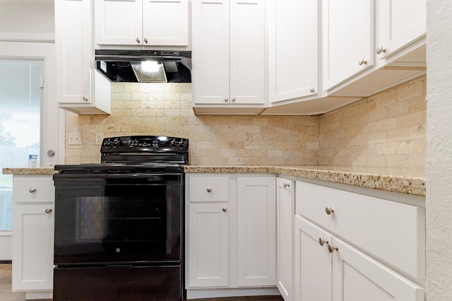 12626 Marble Dr, Houston, TX 77070 - kitchen featuring electric range, exhaust hood, and white cabinets