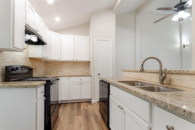 12626 Marble Dr, Houston, TX 77070 - kitchen with black appliances, a sink, decorative backsplash, light stone counters, and lofted ceiling