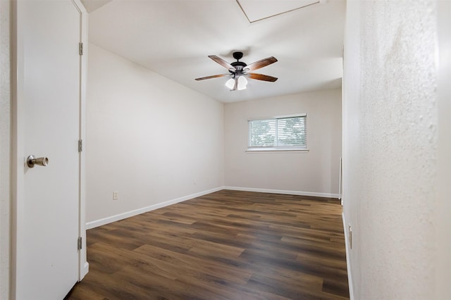 12626 Marble Dr, Houston, TX 77070 - empty room with dark wood-type flooring, baseboards, and ceiling fan