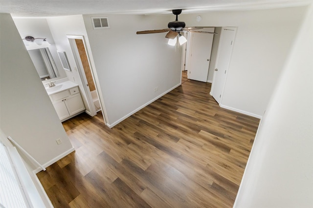 12626 Marble Dr, Houston, TX 77070 - unfurnished room featuring a sink, ceiling fan, wood finished floors, and baseboards