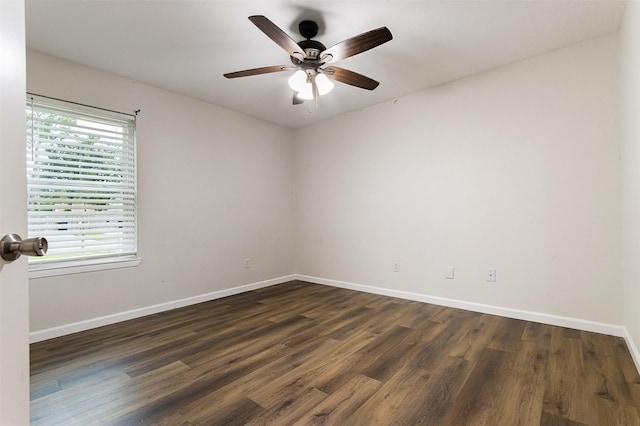 12626 Marble Dr, Houston, TX 77070 - empty room featuring dark wood-style floors, baseboards, and a ceiling fan