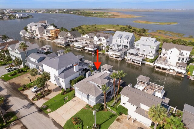 3411 Petite Cir, Galveston, TX 77554 - aerial view of residential area featuring a large body of water
