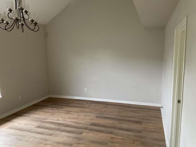 4513 County Road 424, Alvin, TX 77511 - empty room with light wood finished floors, a chandelier, baseboards, and lofted ceiling
