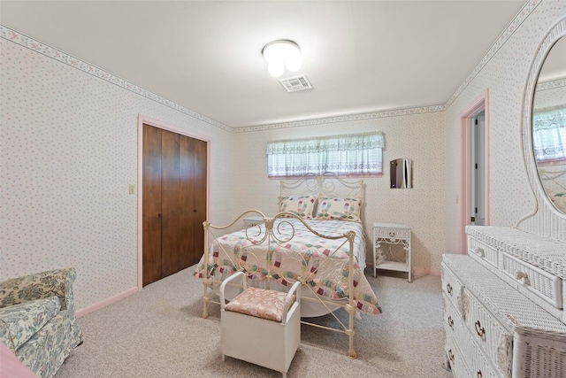 613 Bolling Green Dr, Wharton, TX 77488 - bedroom with wallpapered walls, light colored carpet, and multiple windows