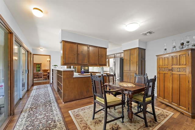 613 Bolling Green Dr, Wharton, TX 77488 - dining space featuring wood finished floors