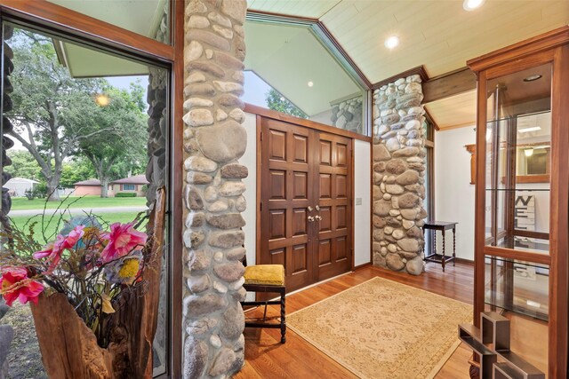 613 Bolling Green Dr, Wharton, TX 77488 - entryway with plenty of natural light, wood finished floors, vaulted ceiling, and recessed lighting
