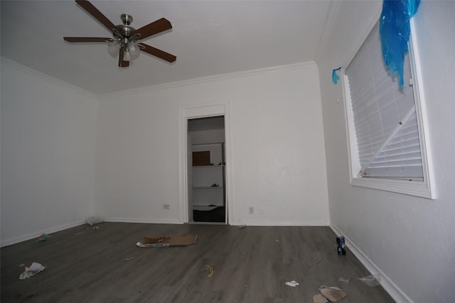 1440 Euclid St, Beaumont, TX 77705 - unfurnished room with wood finished floors, ornamental molding, ceiling fan, and baseboards