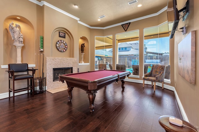 15818 Conners Ace Dr, Spring, TX 77379 - playroom with crown molding, wood finished floors, plenty of natural light, billiards table, and a fireplace