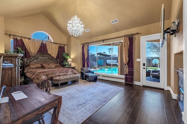 15818 Conners Ace Dr, Spring, TX 77379 - bedroom featuring a chandelier, lofted ceiling, multiple windows, access to exterior, and wood finished floors