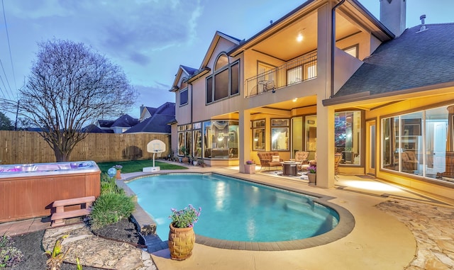 15818 Conners Ace Dr, Spring, TX 77379 - view of swimming pool with a hot tub, a patio area, and an outdoor living space