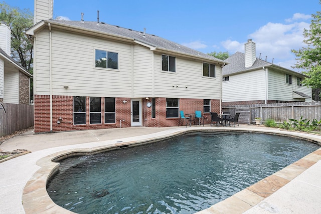 15242 Shapiro Springs Ln, Houston, TX 77095 - view of swimming pool with a patio area and a fenced backyard