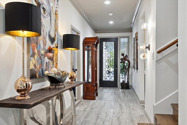 7 Woodstone St, Houston, TX 77024 - entrance foyer with crown molding, stairs, light wood-type flooring, and recessed lighting