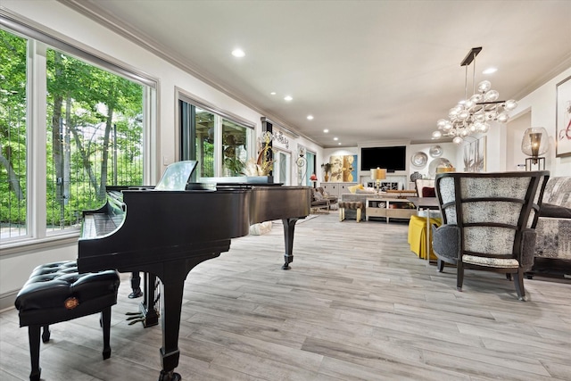 7 Woodstone St, Houston, TX 77024 - sitting room featuring ornamental molding, healthy amount of natural light, light wood finished floors, and recessed lighting