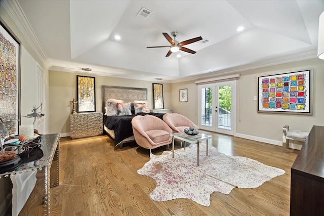 7 Woodstone St, Houston, TX 77024 - bedroom with a raised ceiling, access to exterior, recessed lighting, crown molding, and wood finished floors