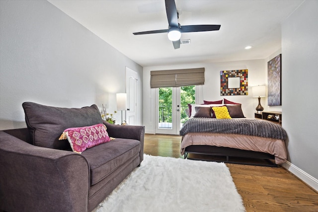 7 Woodstone St, Houston, TX 77024 - bedroom with access to exterior, wood finished floors, french doors, baseboards, and a ceiling fan