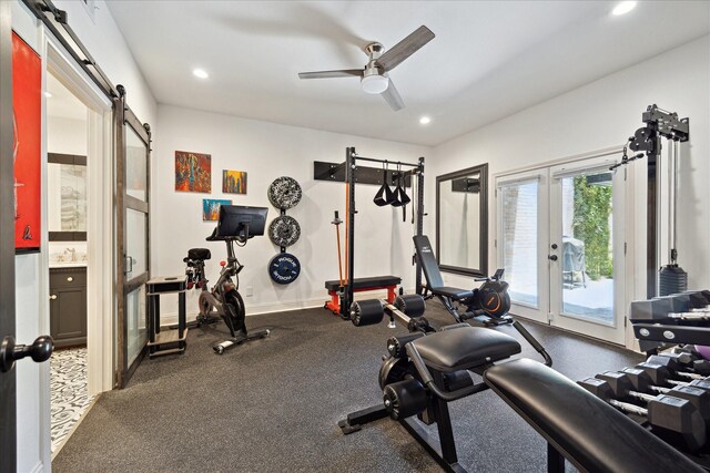 7 Woodstone St, Houston, TX 77024 - workout room with a barn door, a ceiling fan, french doors, recessed lighting, and a sink