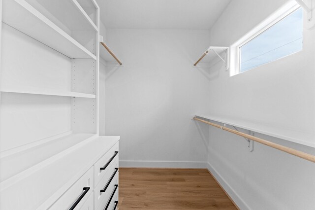 514 Melbourne St Unit B, Houston, TX 77022 - walk in closet featuring light wood finished floors