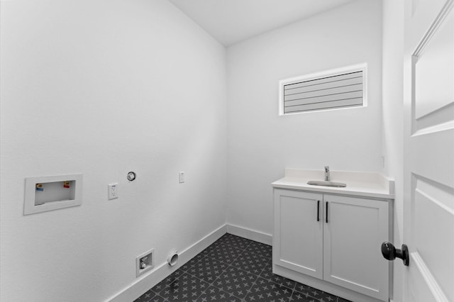 514 Melbourne St Unit B, Houston, TX 77022 - washroom with hookup for a washing machine, cabinet space, gas dryer hookup, electric dryer hookup, and baseboards