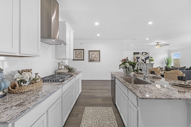 5302 Allen Cay, Texas City, TX 77590 - kitchen with wall chimney exhaust hood, a sink, appliances with stainless steel finishes, tasteful backsplash, and recessed lighting
