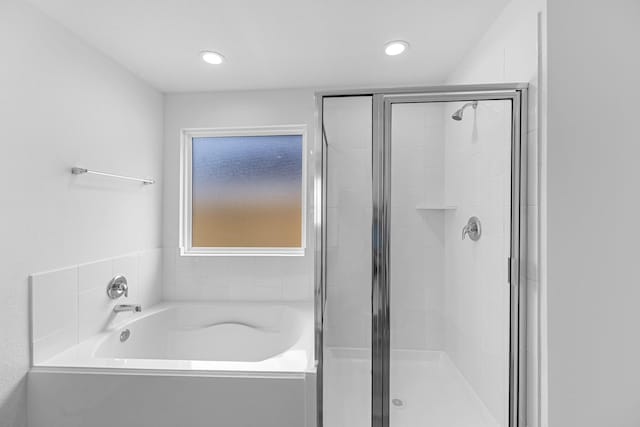 5302 Allen Cay, Texas City, TX 77590 - full bathroom featuring a shower stall, a garden tub, and recessed lighting