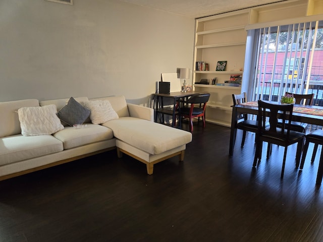 1901 S Voss Rd Unit 33, Houston, TX 77057 - living area with dark wood finished floors and built in features