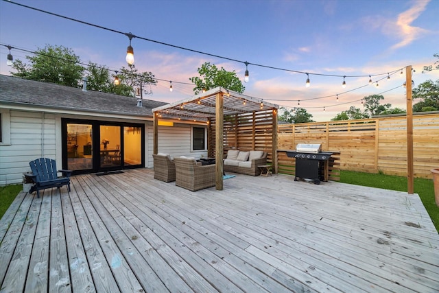 4509 Randwick Dr, Houston, TX 77092 - deck at dusk with outdoor lounge area and grilling area