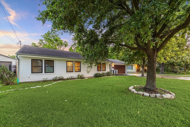 4509 Randwick Dr, Houston, TX 77092 - ranch-style home featuring an attached garage, a yard, roof with shingles, and driveway