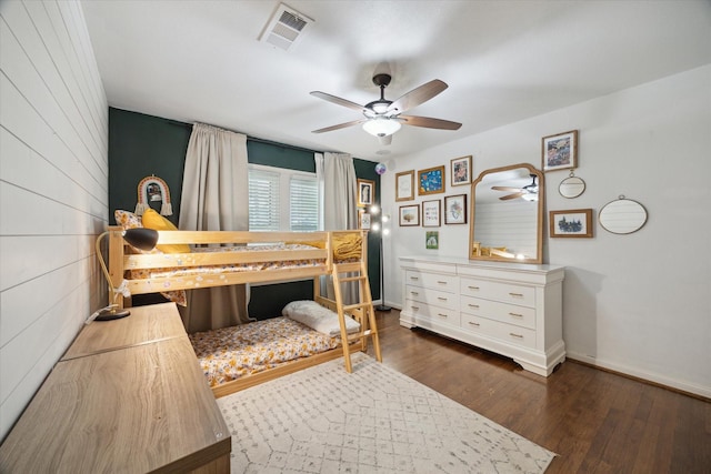 4509 Randwick Dr, Houston, TX 77092 - bedroom with dark wood-style flooring, a ceiling fan, and baseboards