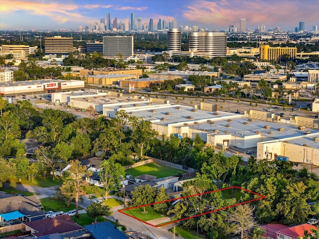 4509 Randwick Dr, Houston, TX 77092 - aerial view at dusk of property parcel outlined and a skyline view
