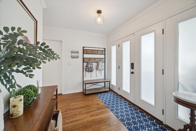 4509 Randwick Dr, Houston, TX 77092 - foyer featuring light wood-style flooring, crown molding, and baseboards