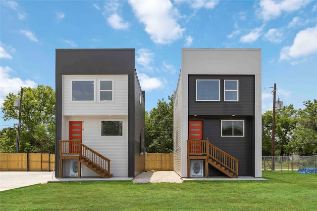 2114 Des Chaumes St, Houston, TX 77026 - rear view of property featuring stairway