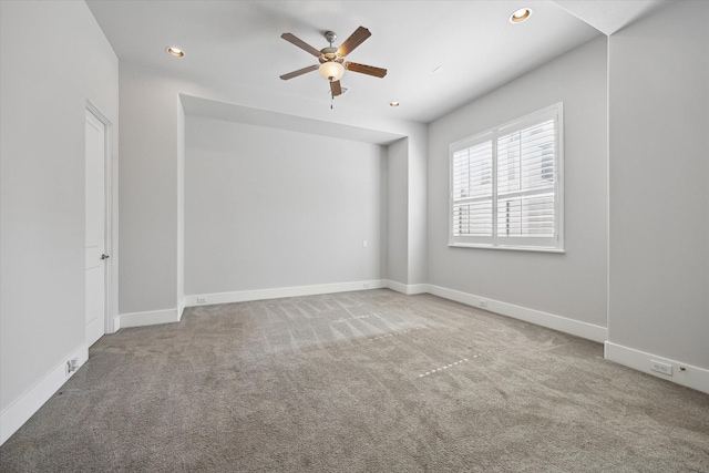 5644 Larkin St, Houston, TX 77007 - carpeted spare room with a ceiling fan, recessed lighting, and baseboards