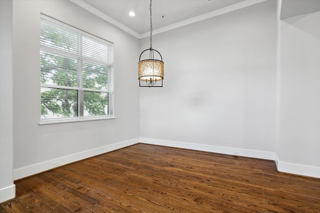 5644 Larkin St, Houston, TX 77007 - unfurnished room featuring ornamental molding, baseboards, a chandelier, and dark wood-style flooring