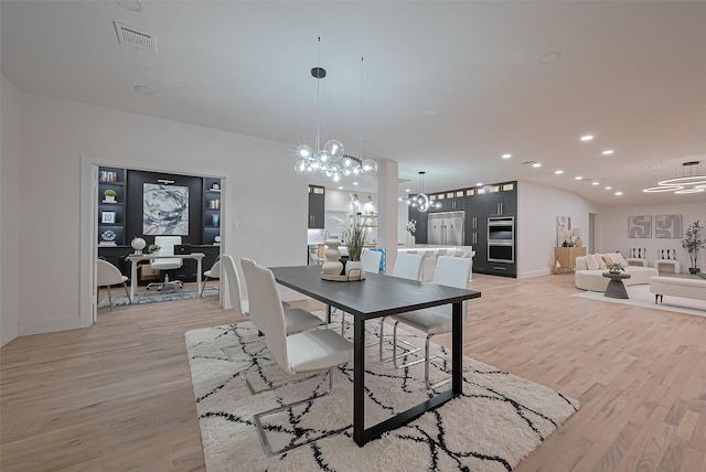 4434 Sarong Dr, Houston, TX 77096 - dining space featuring a chandelier, light wood finished floors, baseboards, and recessed lighting