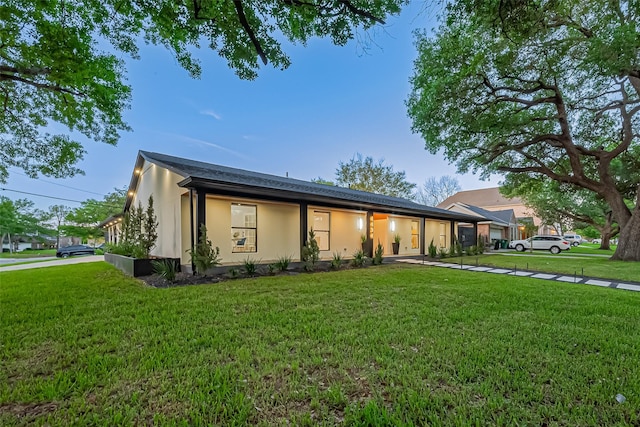 4434 Sarong Dr, Houston, TX 77096 - view of front facade featuring a front lawn and stucco siding