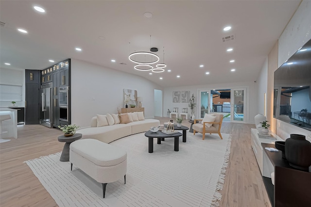 4434 Sarong Dr, Houston, TX 77096 - living room with light wood-style flooring, recessed lighting, and vaulted ceiling