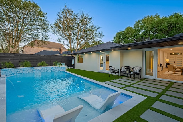4434 Sarong Dr, Houston, TX 77096 - view of swimming pool with french doors and a patio