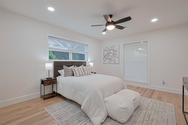 4434 Sarong Dr, Houston, TX 77096 - bedroom featuring baseboards, light wood-style floors, recessed lighting, and a ceiling fan