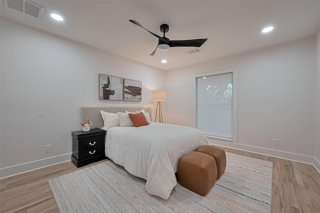 4434 Sarong Dr, Houston, TX 77096 - bedroom with light wood-style flooring, baseboards, ceiling fan, and recessed lighting