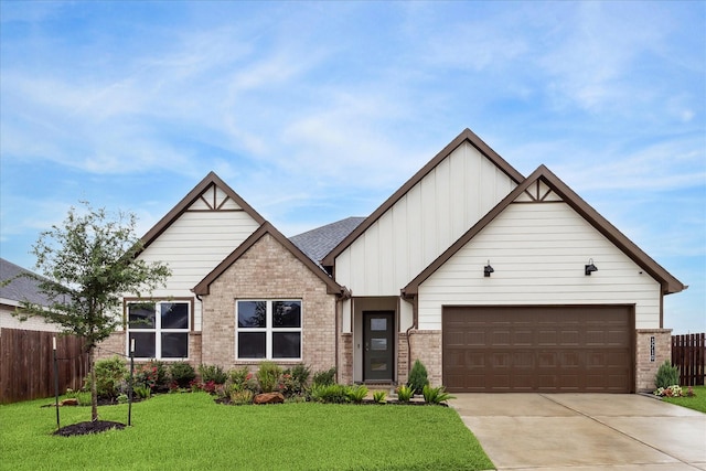 3710 Birtley Bend Way, Fulshear, TX 77441 - view of front facade featuring board and batten siding, concrete driveway, brick siding, and a garage