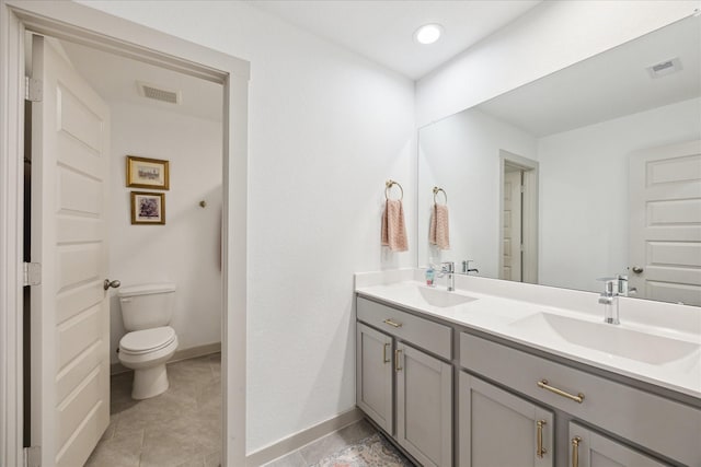3710 Birtley Bend Way, Fulshear, TX 77441 - full bathroom with double vanity, toilet, and baseboards