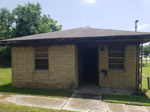 3923 Aledo St, Houston, TX 77051 - view of front facade with a shingled roof and brick siding