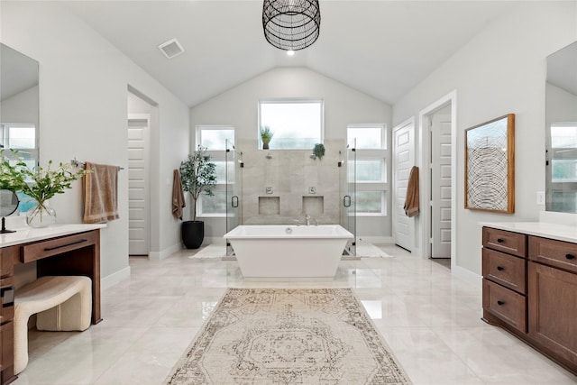 7851 Longhorn Trl, Fulshear, TX 77406 - full bathroom with vaulted ceiling, vanity, a soaking tub, a stall shower, and plenty of natural light