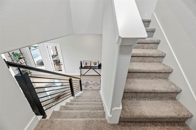 7851 Longhorn Trl, Fulshear, TX 77406 - stairway featuring baseboards