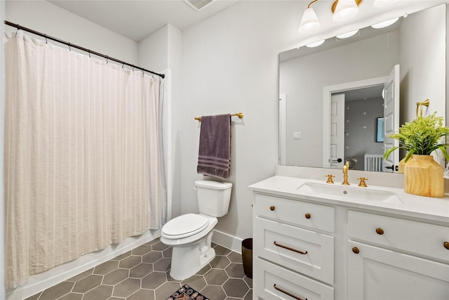 7851 Longhorn Trl, Fulshear, TX 77406 - full bath featuring toilet, vanity, tile patterned flooring, baseboards, and shower / tub combo