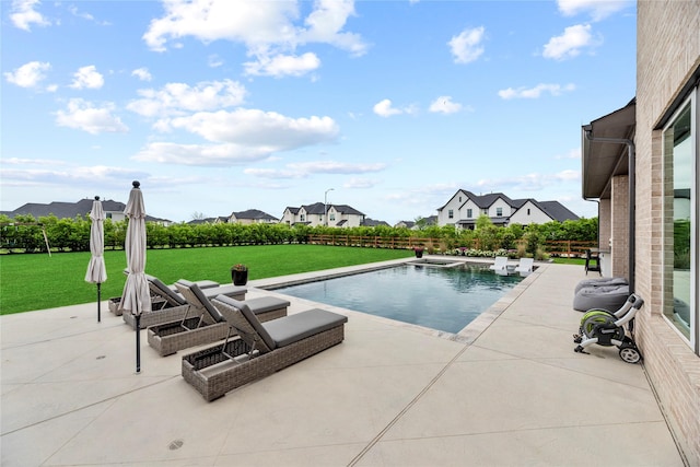 7851 Longhorn Trl, Fulshear, TX 77406 - view of swimming pool with a patio area, a yard, a residential view, and a hot tub