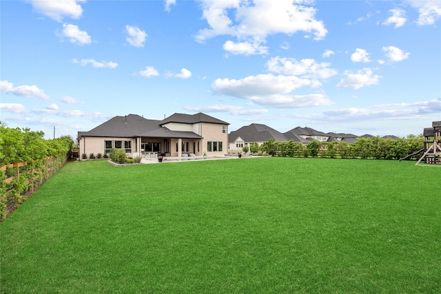 7851 Longhorn Trl, Fulshear, TX 77406 - view of yard with a patio and a playground
