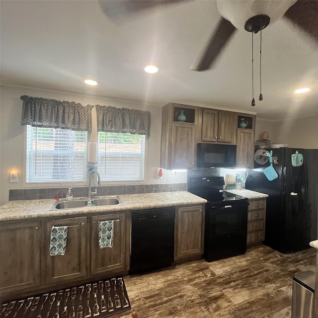 5002 Fm 811, Centerville, TX 75833 - kitchen featuring black appliances, a sink, light countertops, open shelves, and recessed lighting