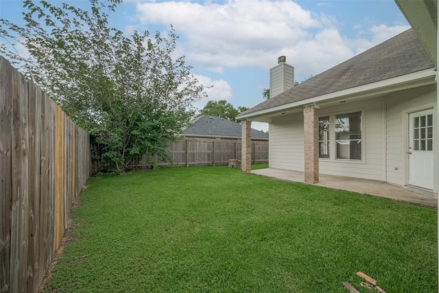 7407 Breda Dr, Baytown, TX 77521 - view of yard featuring a patio area