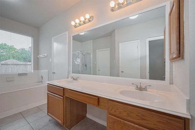 7407 Breda Dr, Baytown, TX 77521 - bathroom featuring double vanity, tile patterned flooring, a bath, and a shower stall